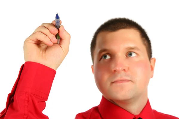 Businessman in red shirt with pen in hand — Stock Photo, Image