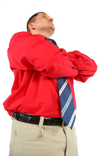 Empresário de camisa vermelha com as mãos cruzadas — Fotografia de Stock