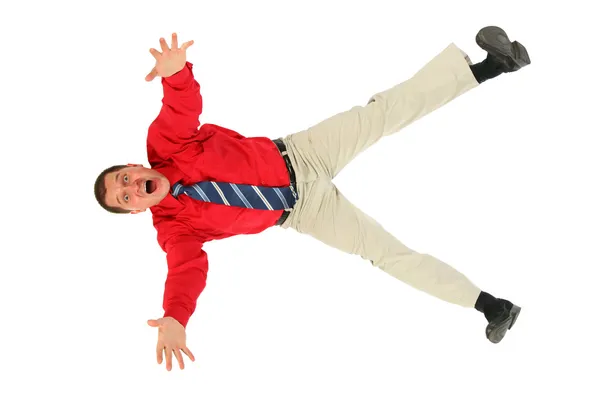 赤シャツのビジネスマンを滝します。 — ストック写真