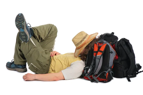 Viaggiatore in cappello di paglia si trova sullo zaino — Foto Stock