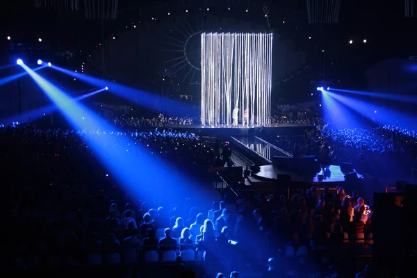 Blue spotlight on concert — Stock Photo, Image