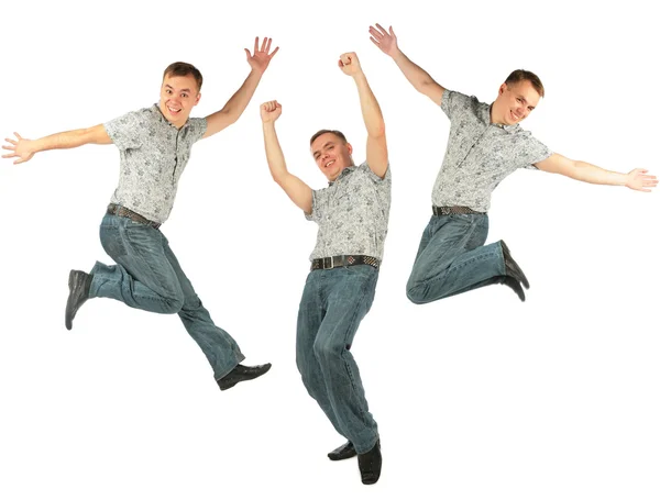 Щаслива стрибаюча людина з піднятою рукою — стокове фото