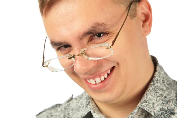Lachende jongeman in glazen — Stockfoto