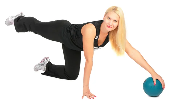 Sport blond makes exercise with ball — Stock Photo, Image