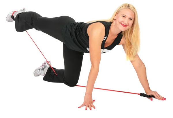 Deporte rubio hace ejercicio con cuerda —  Fotos de Stock