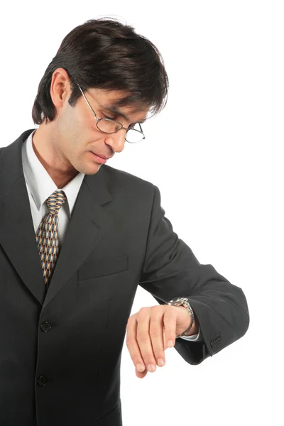 Hombre de negocios mira el reloj — Foto de Stock