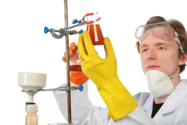Chemist fixes flask on support — Stock Photo, Image