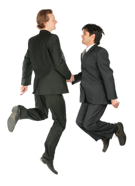 Due uomini d'affari saltano — Foto Stock