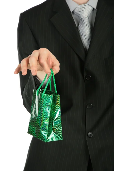 Biznesmen z pakiet prezent w ręku — Zdjęcie stockowe