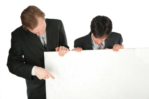 Due uomini d'affari con targa bianca — Foto Stock