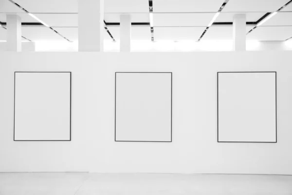 Three frames in showroom — Stock Photo, Image
