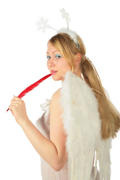 Flicka i ängelns kostym med röd fjäder — Stockfoto