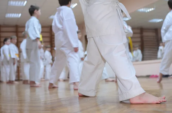 Karate boys in sport hall — Stock Photo, Image