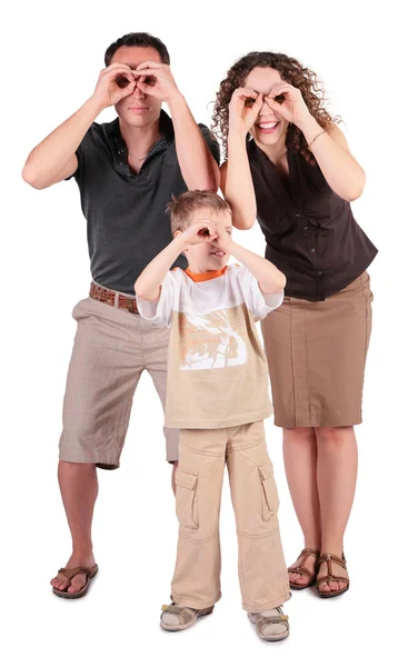 Father, son and mother look in field-glasses from hands Royalty Free Stock Photos