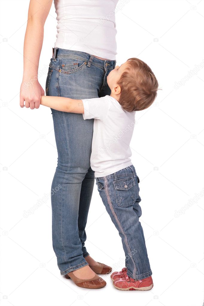 Girl embrace mother legs
