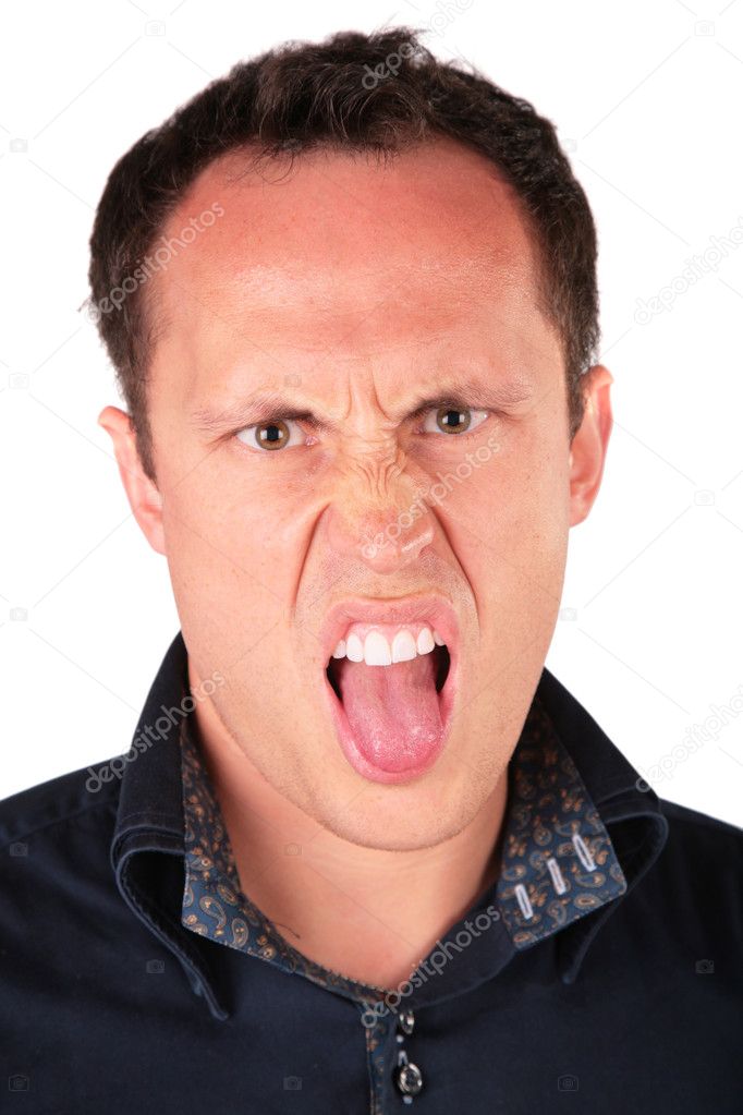 Angry man shows tongue