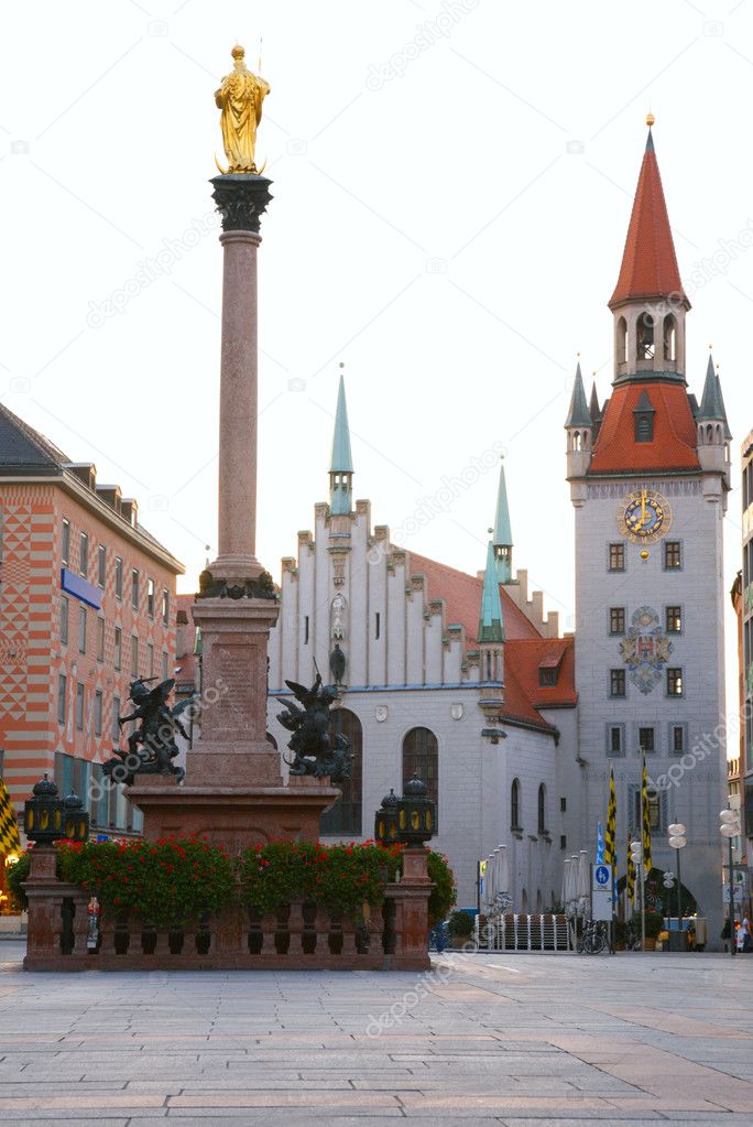 Square of medieval city with monument