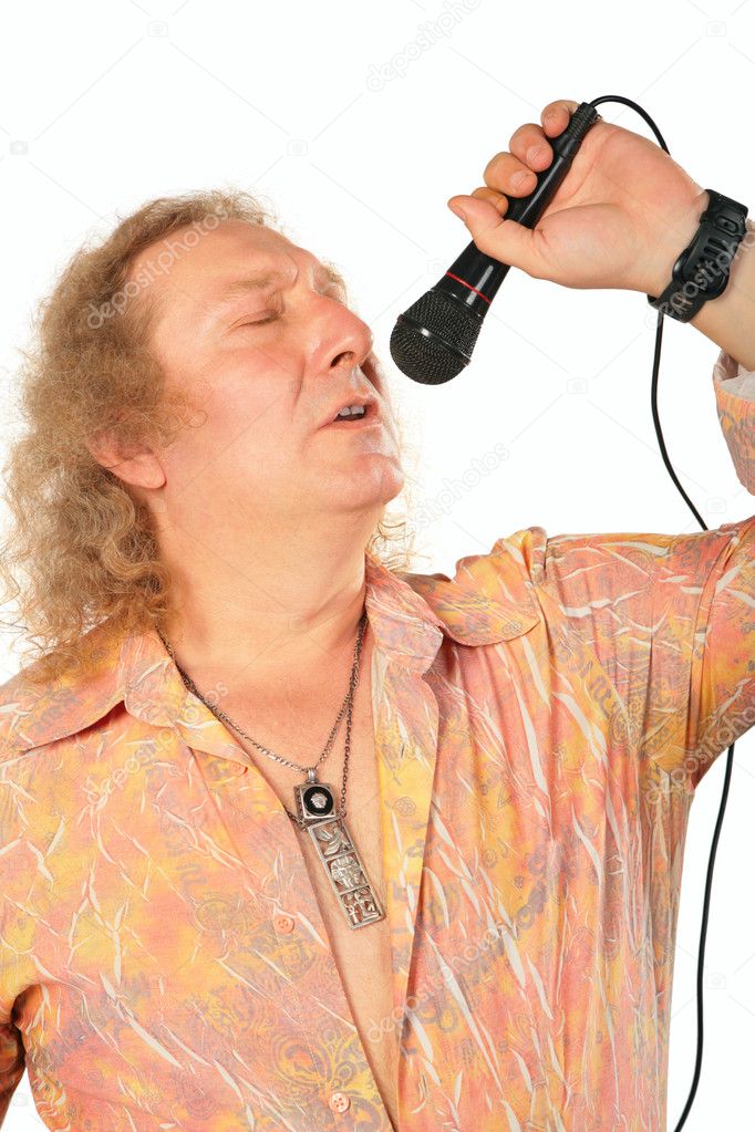 Mature man with microphone