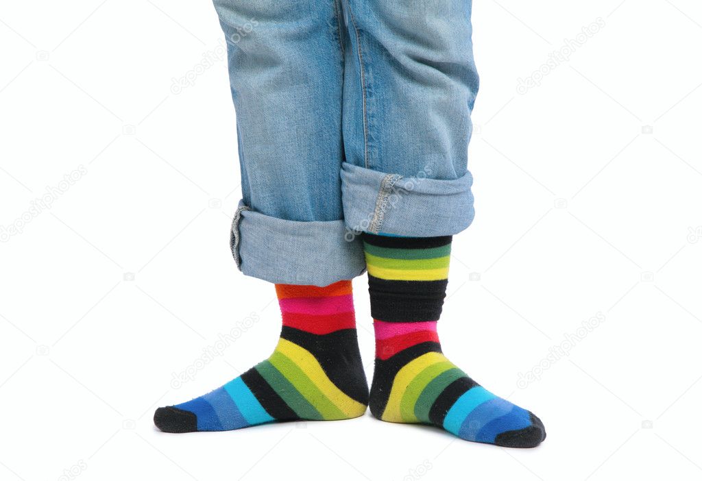 Two feet in multi-coloured socks