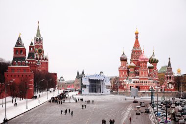 View of Kremlin and St. Basil's cathedral in winter clipart