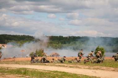 Soldiers in attack in military show from first world war clipart