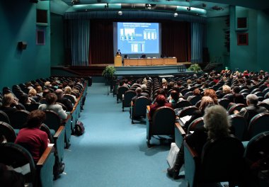 Conference in auditorium
