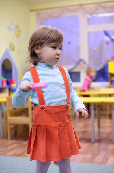 Little girl in kindergarten — Stock Photo, Image