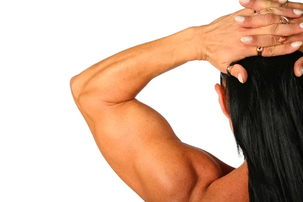 Bodybuilder kvinna bakifrån — Stockfoto