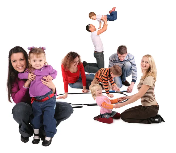 Glücklich spielende Familien — Stockfoto