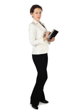 Young beauty brunette woman in business dress, standing and hold clipart