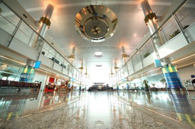 DUBAI - APRIL 19: large hall with chairs, granite floor and col clipart