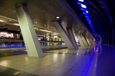 Long corridor with big windows and show-windows of shops in mode clipart