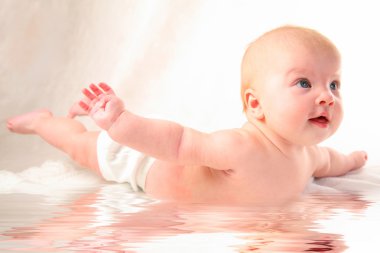 Child in flight reflected in water, collage clipart