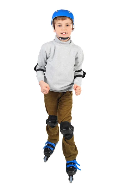 Niño en casco azul sonriendo y patinando aislado en —  Fotos de Stock