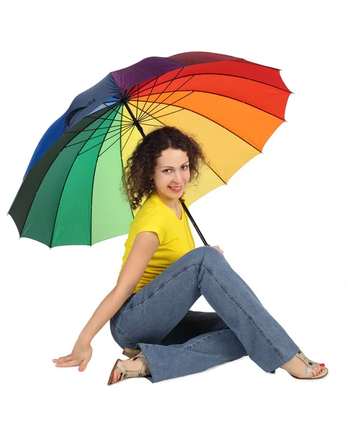 Young attractive woman in yellow shirt with multicolored umbrell — Stock Photo, Image