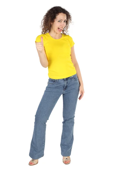 Sarı tişört ve kot pantolon, genç çekici kadın thumbs up gest — Stok fotoğraf