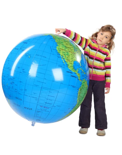 Little girl standing and holding big inflatable globe, isolated — Stock Photo, Image