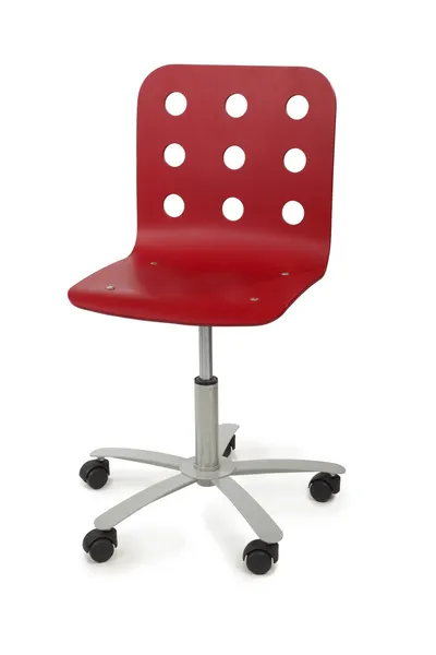 Red modern armchair with circle holes on back, metal base and bl — Stock Photo, Image