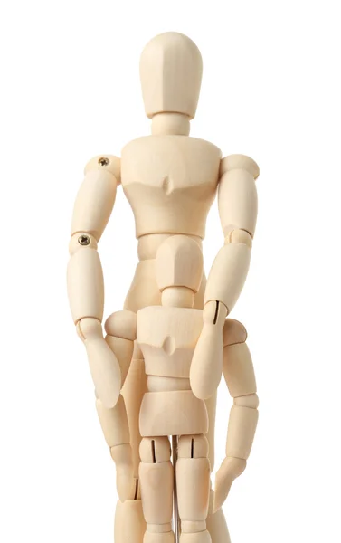 Figure in legno di genitore che abbracciano il suo bambino da dietro, mezzo corpo — Foto Stock