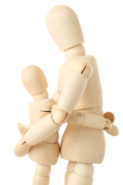 Figure di legno del genitore che abbraccia il suo bambino, mezzo corpo, lato vi — Foto Stock