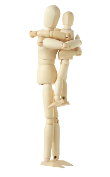 Ξύλινο σχήμα του γονικού στοιχείου κρατώντας και αγκαλιάζοντας το παιδί του, πλευρά vi — Φωτογραφία Αρχείου