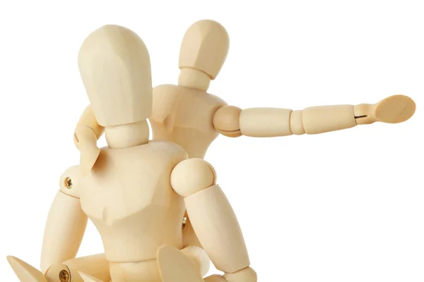 Wooden figures of child sitting on back of his parent and pointi — Stock Photo, Image