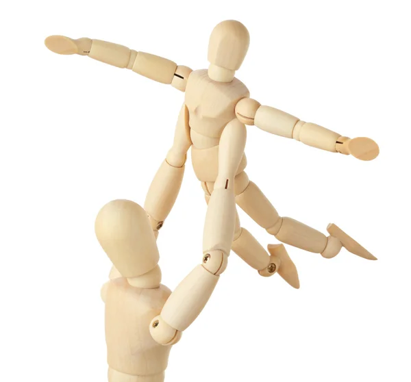 Wooden figures of parent carring his child over his head, child — Stock Photo, Image