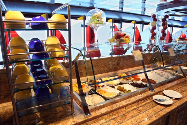 stock image Showcase with food and tableware in dinning room on cruise liner