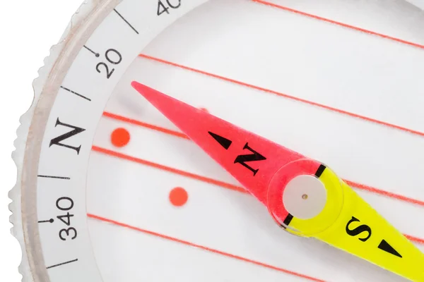 Fragment of plastic compass with an arrow specifying in north is — Stock Photo, Image