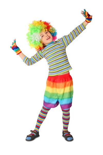 Liten pojke i clown klänning stående isolerad på vit bakgrund — Stockfoto