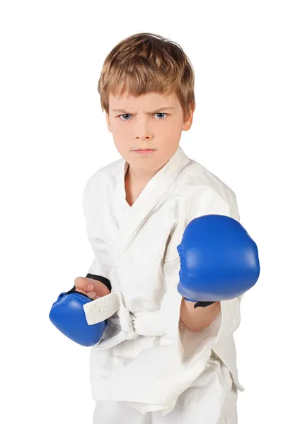 Little boxer boy in white dress and blue boxing gloves fighting — Stock Photo, Image