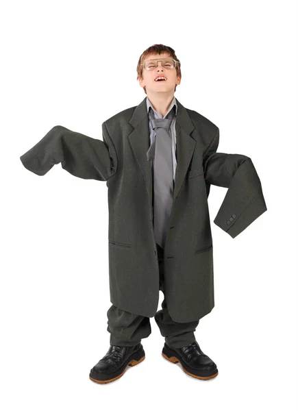 Menino em terno grande homem cinzento, botas e óculos isola chão — Fotografia de Stock