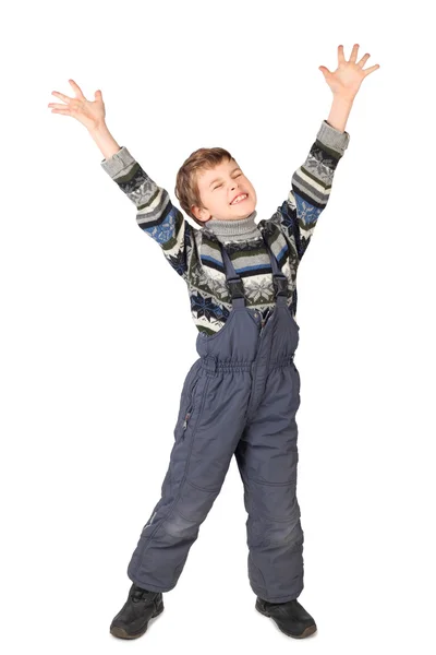Kleiner Junge im einteiligen Anzug lächelt und streckt isoliert die Hand in die Höhe — Stockfoto