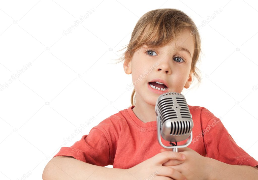 Pretty little girl in red T-shirt sing in old style microphone i